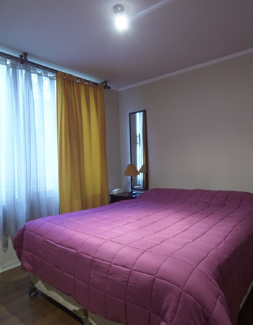 Imagen de la habitación del Hotel Vr Suite Santiago. Foto 8