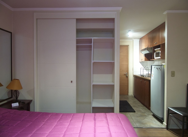 Imagen de la habitación del Hotel Vr Suite Santiago. Foto 10