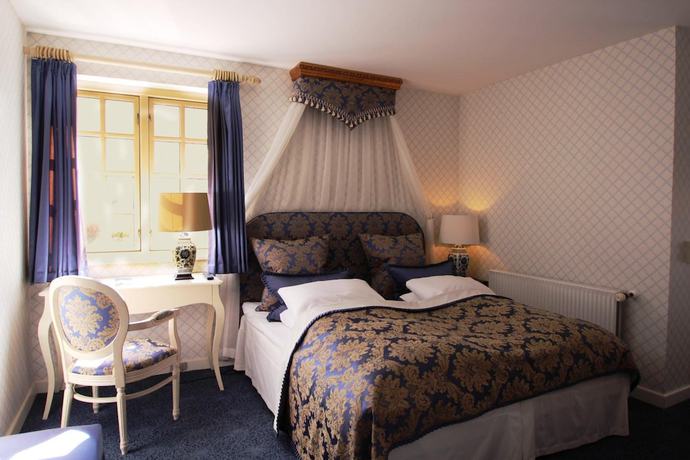 Imagen de la habitación del Hotel Vraa Slotshotel, Tylstrup. Foto 3