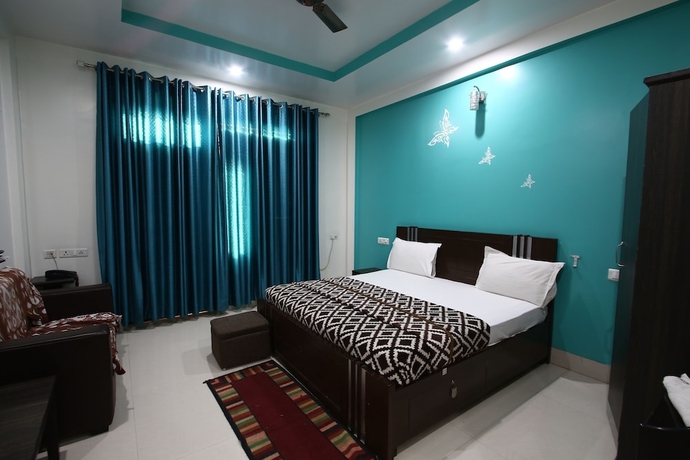 Imagen de la habitación del Hotel Vrinda Palace. Foto 7