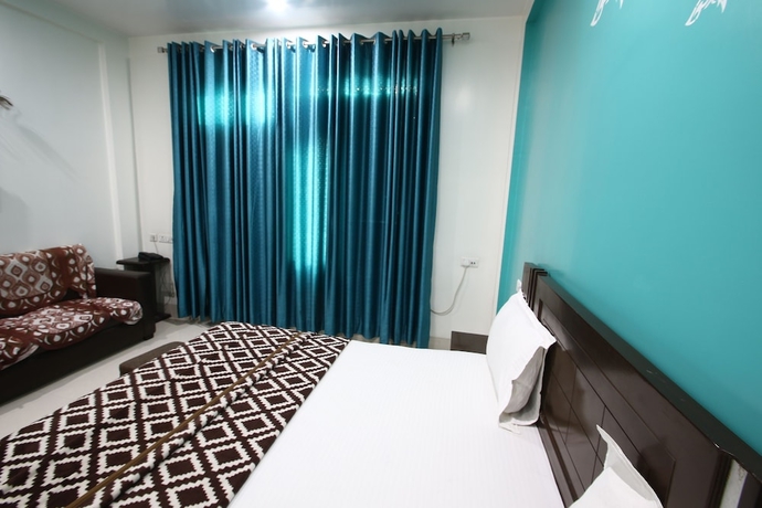 Imagen de la habitación del Hotel Vrinda Palace. Foto 11