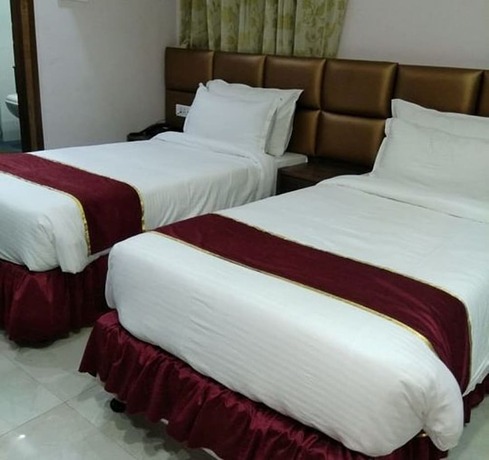 Imagen de la habitación del Hotel Vrinda Regency. Foto 15