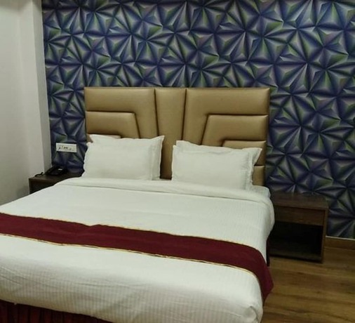 Imagen de la habitación del Hotel Vrinda Regency. Foto 18