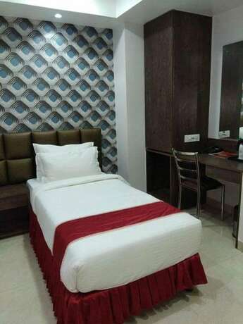 Imagen de la habitación del Hotel Vrinda Regency. Foto 19