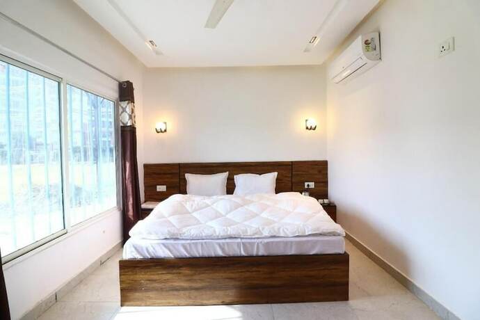 Imagen de la habitación del Hotel Vrinda Resort by Dcrest. Foto 17