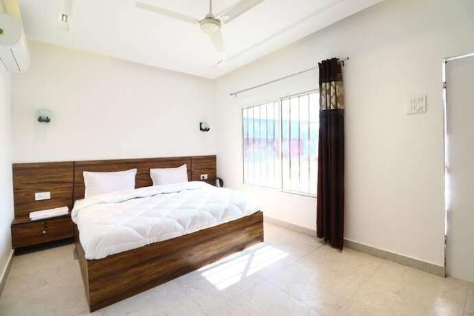 Imagen de la habitación del Hotel Vrinda Resort by Dcrest. Foto 19