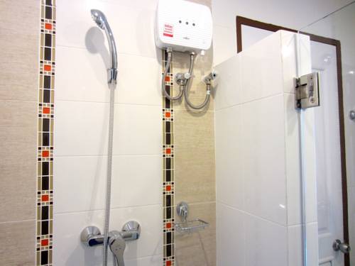 Imagen de la habitación del Hotel V-twin Apartment. Foto 7