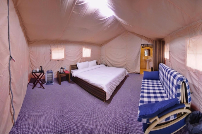 Imagen de la habitación del Hotel Vue Magique Resorts and Camps. Foto 4