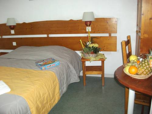 Imagen de la habitación del Hotel Vvf Villages Premanon. Foto 6