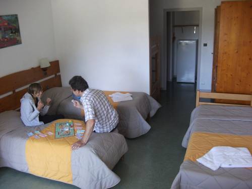 Imagen de la habitación del Hotel Vvf Villages Premanon. Foto 7