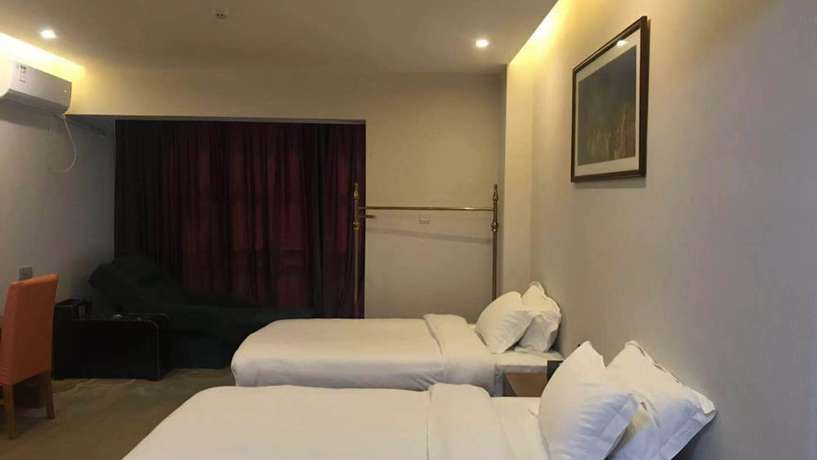 Imagen de la habitación del Hotel Vyluk J Fuxing Road Lijiang. Foto 2