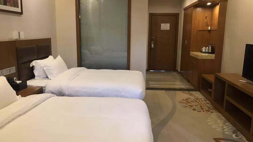 Imagen de la habitación del Hotel Vyluk J Fuxing Road Lijiang. Foto 3