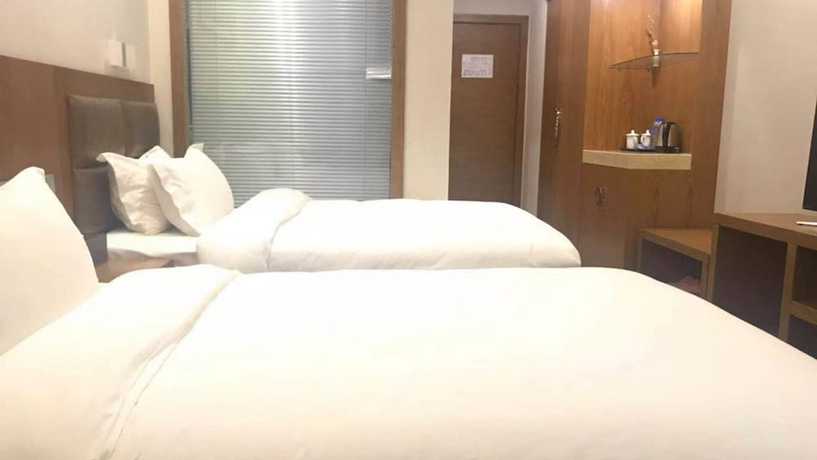 Imagen de la habitación del Hotel Vyluk J Fuxing Road Lijiang. Foto 4