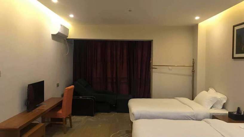 Imagen de la habitación del Hotel Vyluk J Fuxing Road Lijiang. Foto 5