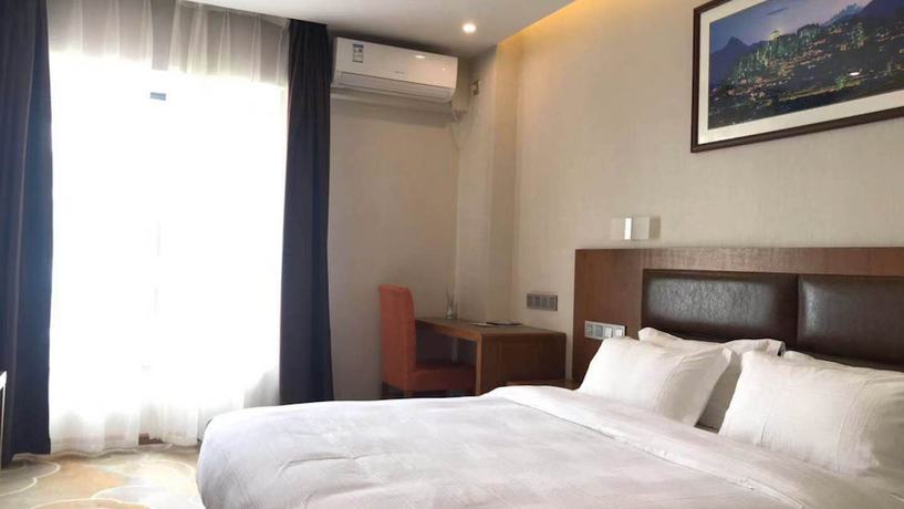 Imagen de la habitación del Hotel Vyluk J Fuxing Road Lijiang. Foto 6