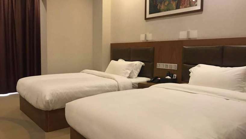 Imagen de la habitación del Hotel Vyluk J Fuxing Road Lijiang. Foto 7