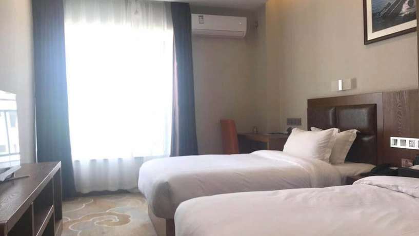 Imagen de la habitación del Hotel Vyluk J Fuxing Road Lijiang. Foto 8