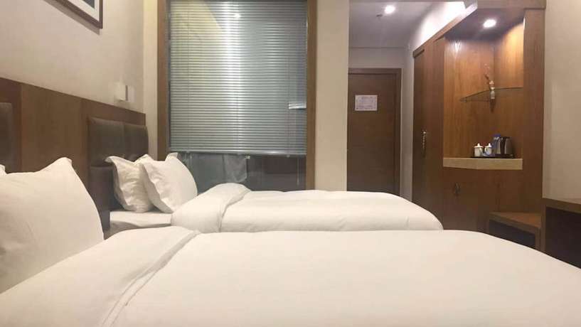 Imagen de la habitación del Hotel Vyluk J Fuxing Road Lijiang. Foto 9