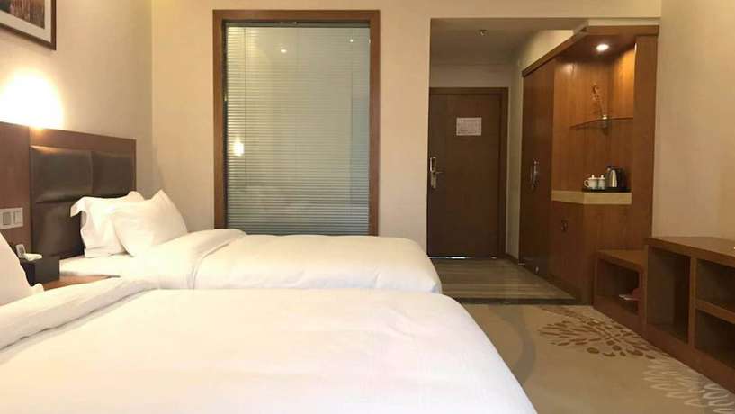 Imagen de la habitación del Hotel Vyluk J Fuxing Road Lijiang. Foto 10