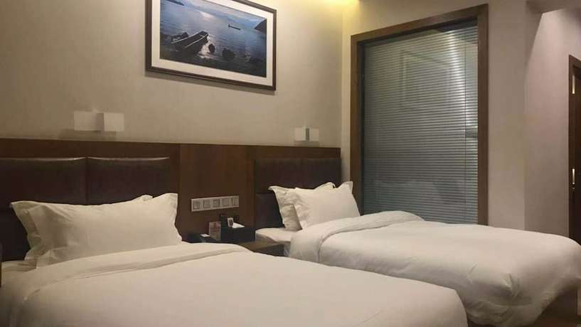 Imagen de la habitación del Hotel Vyluk J Fuxing Road Lijiang. Foto 14