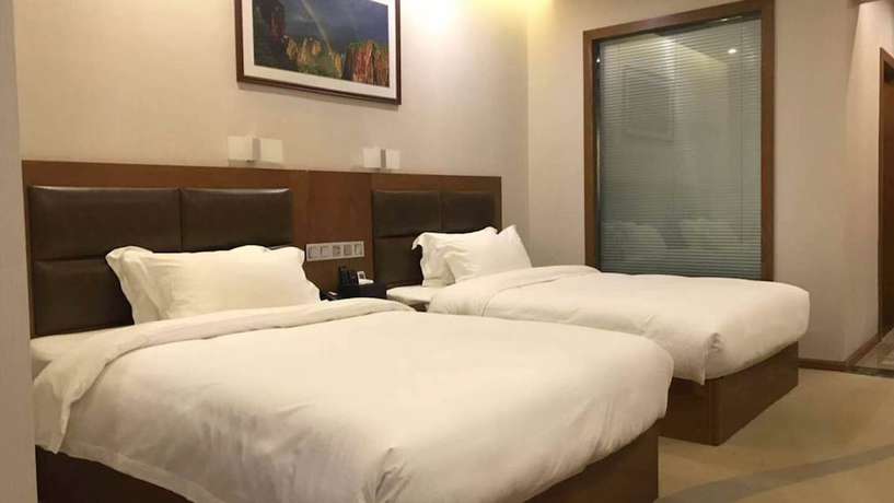 Imagen de la habitación del Hotel Vyluk J Fuxing Road Lijiang. Foto 15