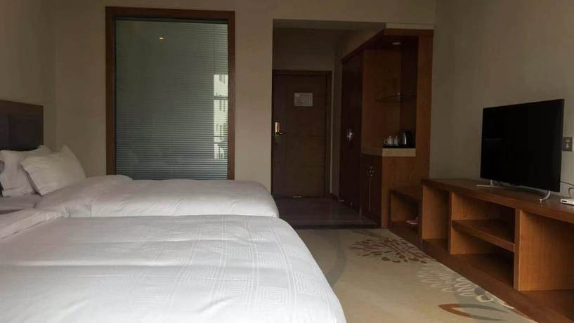 Imagen de la habitación del Hotel Vyluk J Fuxing Road Lijiang. Foto 16