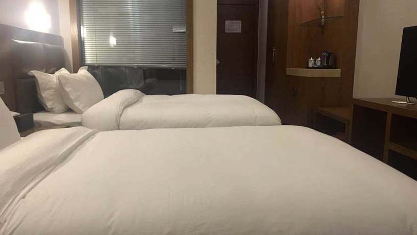 Imagen de la habitación del Hotel Vyluk J Fuxing Road Lijiang. Foto 18