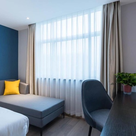 Imagen de la habitación del Hotel Vyluk J Hotel Jinan West Railway Station. Foto 5