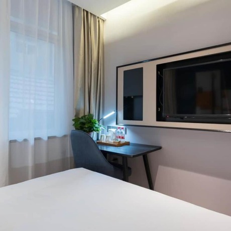 Imagen de la habitación del Hotel Vyluk J Hotel Jinan West Railway Station. Foto 8