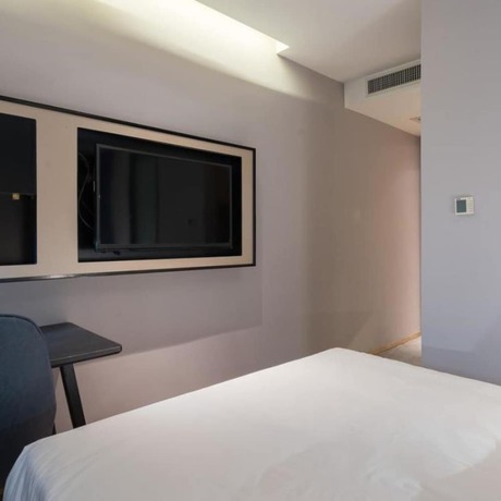 Imagen de la habitación del Hotel Vyluk J Hotel Jinan West Railway Station. Foto 10