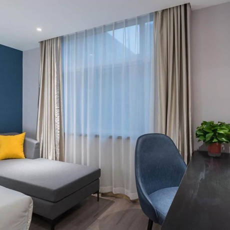 Imagen de la habitación del Hotel Vyluk J Hotel Jinan West Railway Station. Foto 12
