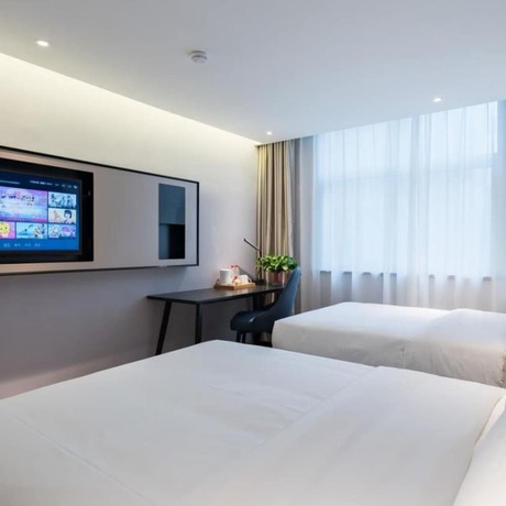 Imagen de la habitación del Hotel Vyluk J Hotel Jinan West Railway Station. Foto 14