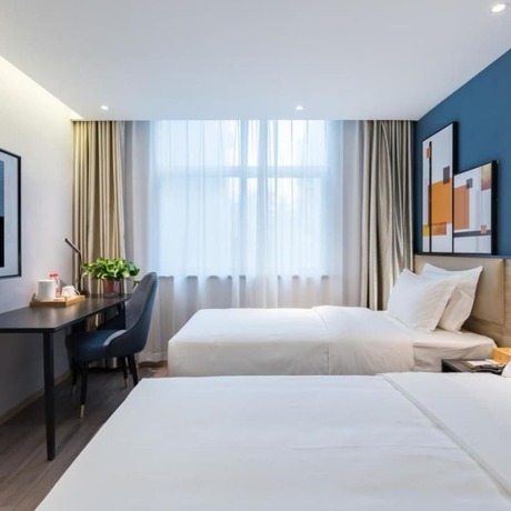 Imagen de la habitación del Hotel Vyluk J Hotel Jinan West Railway Station. Foto 17