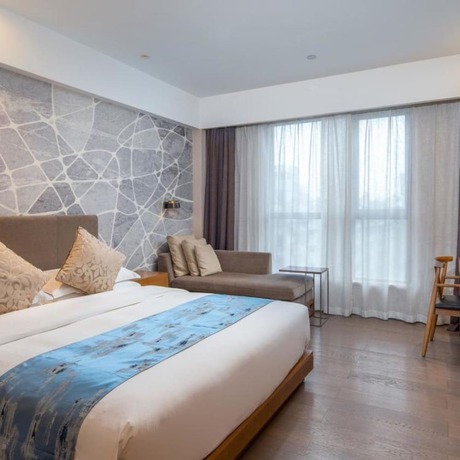 Imagen de la habitación del Hotel Vyluk J Hotel Lishui Rail Station. Foto 6