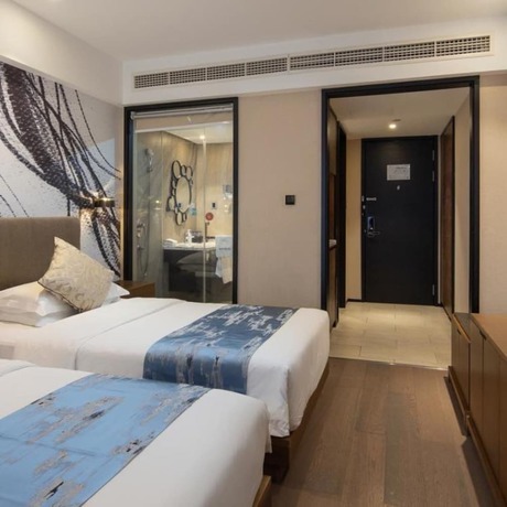 Imagen de la habitación del Hotel Vyluk J Hotel Lishui Rail Station. Foto 12