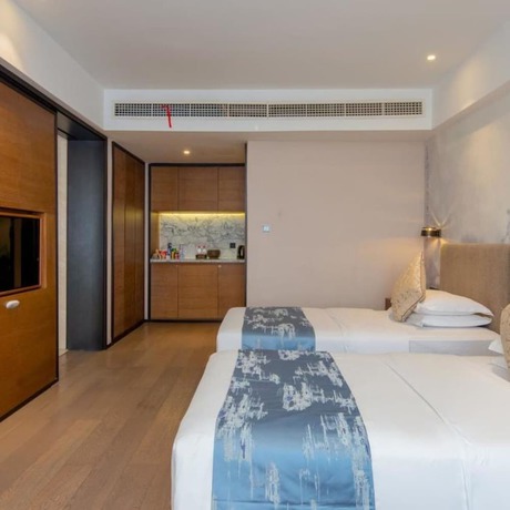 Imagen de la habitación del Hotel Vyluk J Hotel Lishui Rail Station. Foto 13