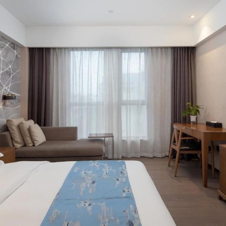 Imagen de la habitación del Hotel Vyluk J Hotel Lishui Rail Station. Foto 14