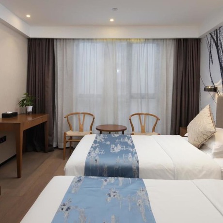 Imagen de la habitación del Hotel Vyluk J Hotel Lishui Rail Station. Foto 15