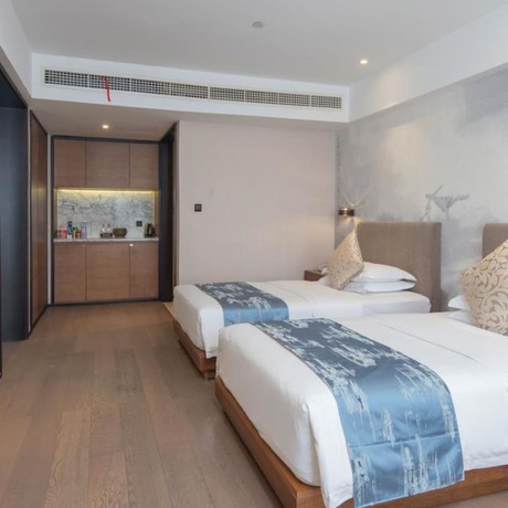 Imagen de la habitación del Hotel Vyluk J Hotel Lishui Rail Station. Foto 16