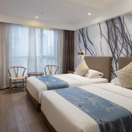 Imagen de la habitación del Hotel Vyluk J Hotel Lishui Rail Station. Foto 19