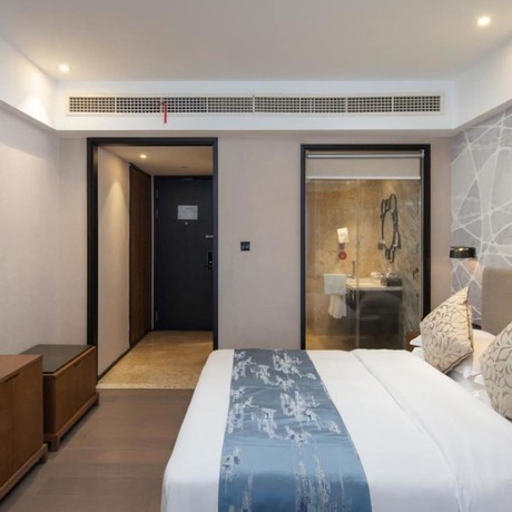 Imagen de la habitación del Hotel Vyluk J Hotel Lishui Rail Station. Foto 20