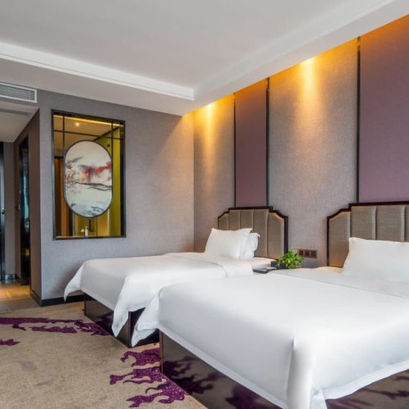 Imagen de la habitación del Hotel Vyluk J Hotel Wanda Plaza Xiajie Street. Foto 9
