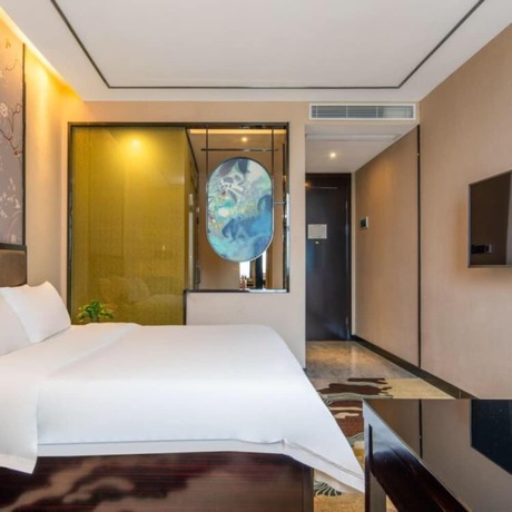 Imagen de la habitación del Hotel Vyluk J Hotel Wanda Plaza Xiajie Street. Foto 11