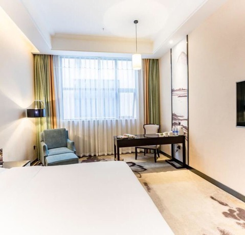 Imagen de la habitación del Hotel Vyluk J Hotel Wanda Plaza Xiajie Street. Foto 12