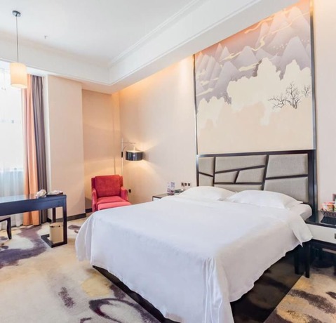 Imagen de la habitación del Hotel Vyluk J Hotel Wanda Plaza Xiajie Street. Foto 13