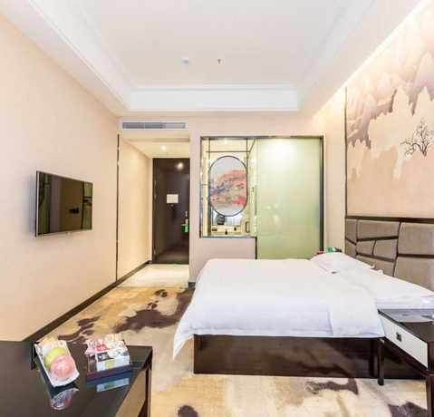 Imagen de la habitación del Hotel Vyluk J Hotel Wanda Plaza Xiajie Street. Foto 16