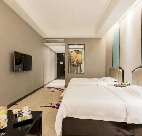 Imagen de la habitación del Hotel Vyluk J Hotel Wanda Plaza Xiajie Street. Foto 17