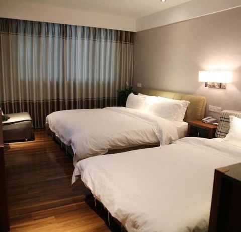 Imagen de la habitación del Hotel Vyluk Renmin 3rd Road Qingyuan. Foto 8