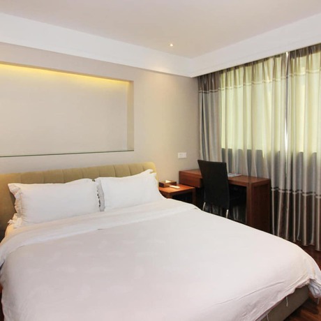 Imagen de la habitación del Hotel Vyluk Renmin 3rd Road Qingyuan. Foto 11