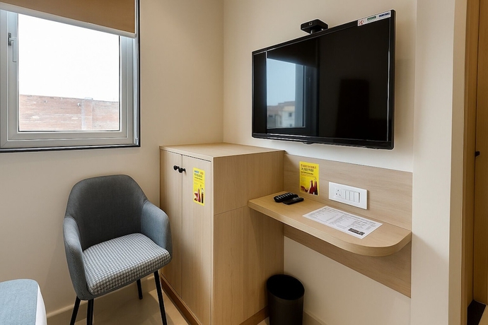 Imagen de la habitación del Hotel Vyom Residency. Foto 14